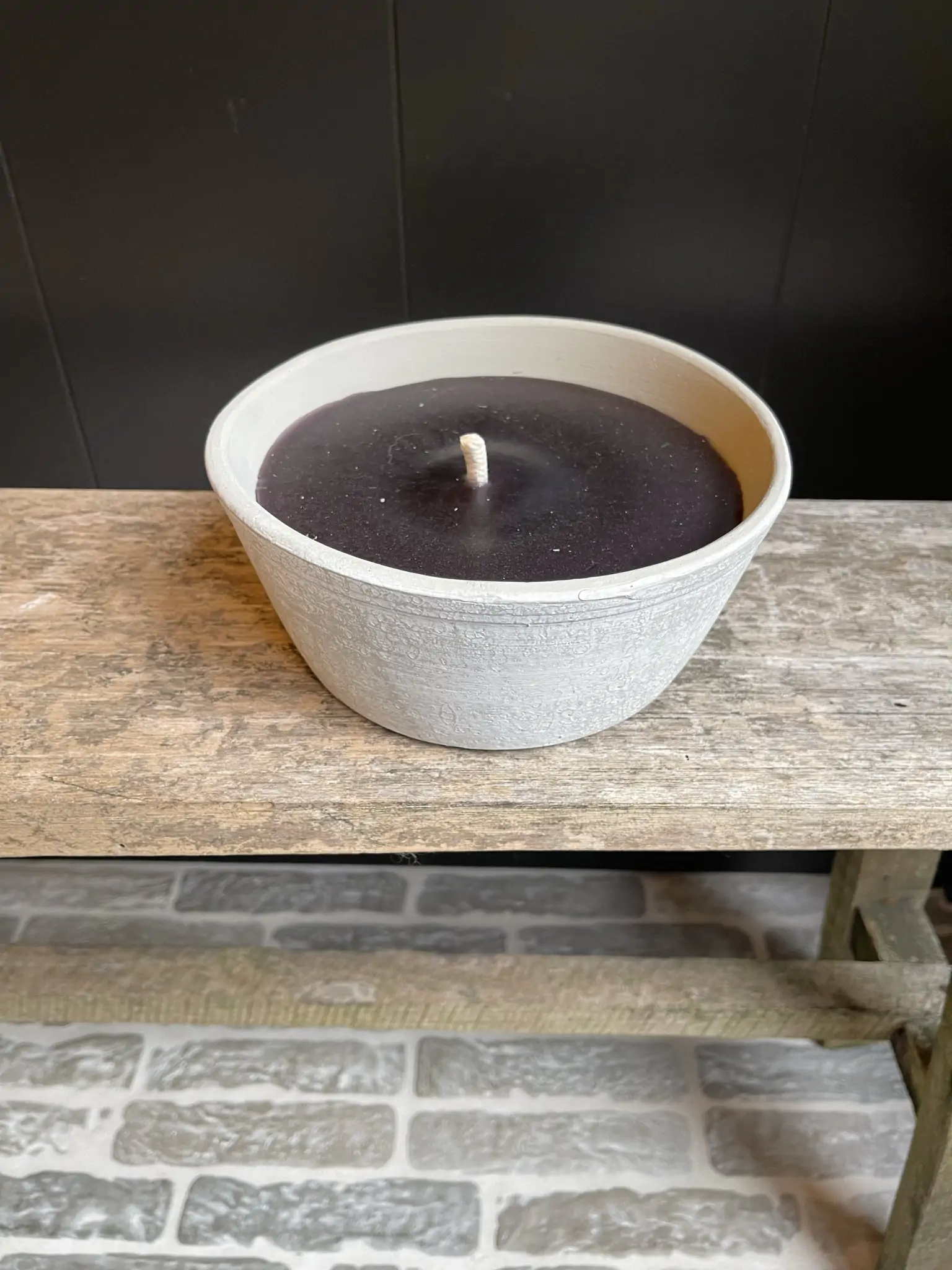Grey age terracotta candle