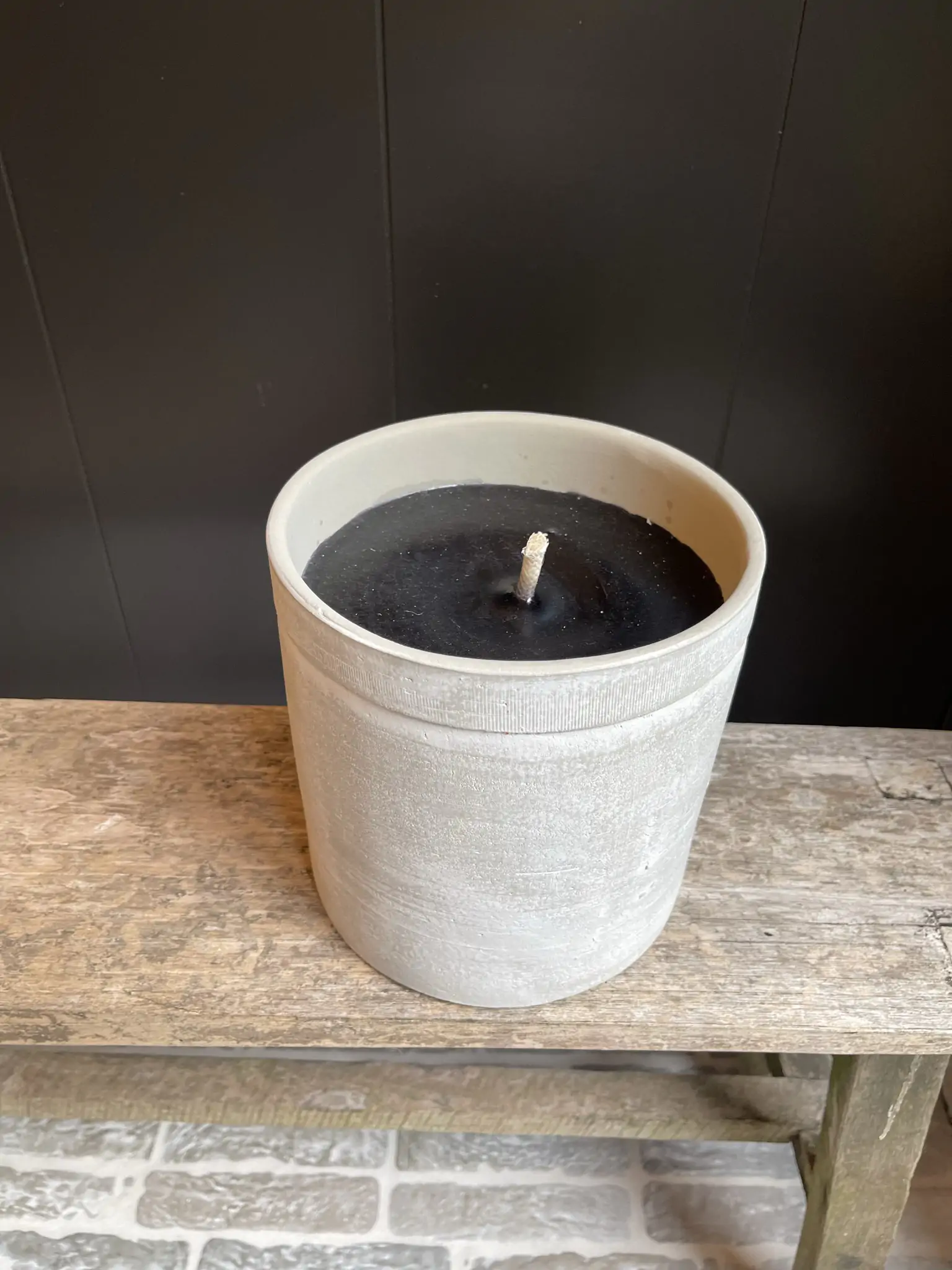 Grey age terracotta candle